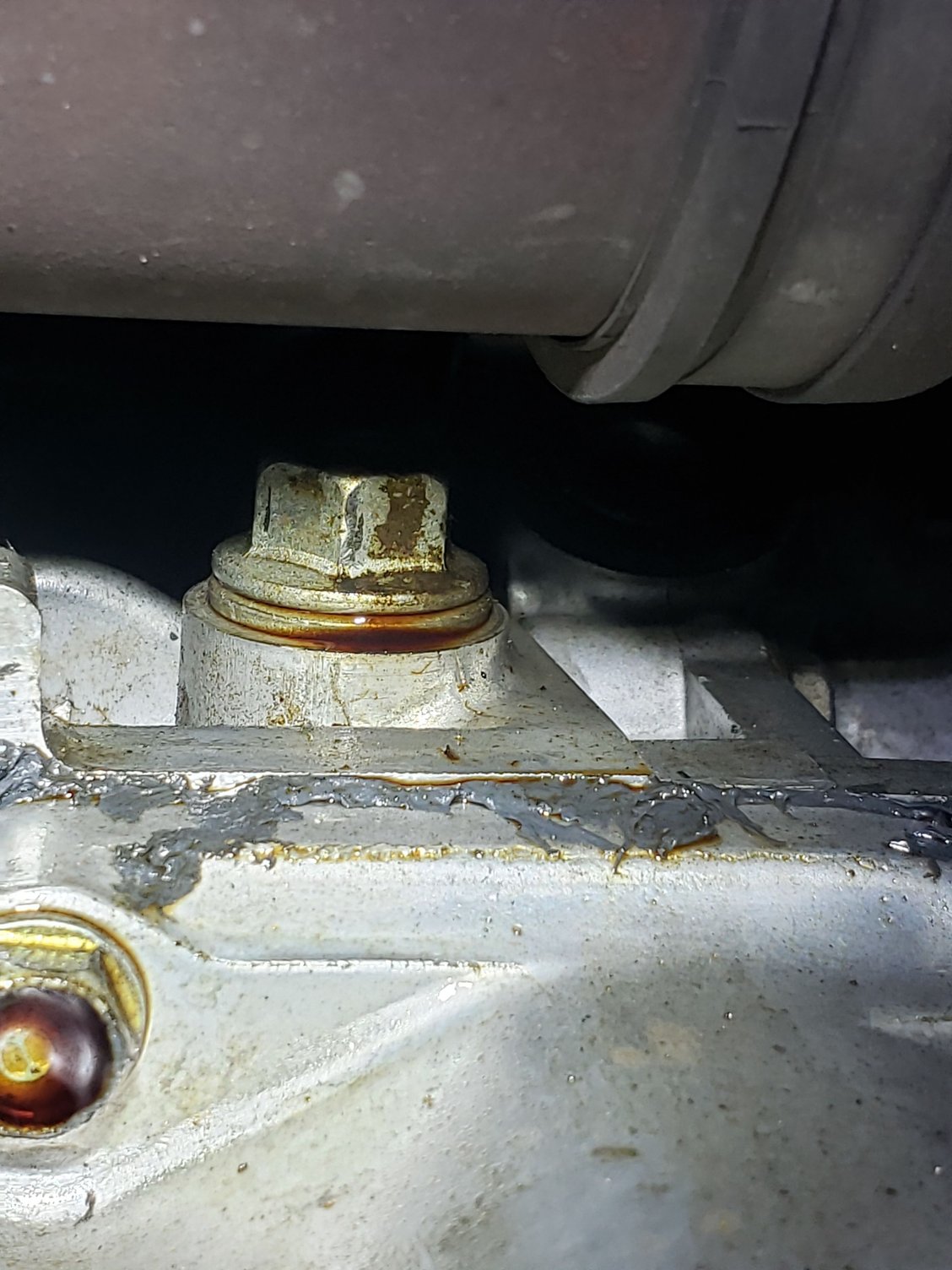Bolt above oil drain plug oil leak help 2005 TL 3.2 AcuraZine