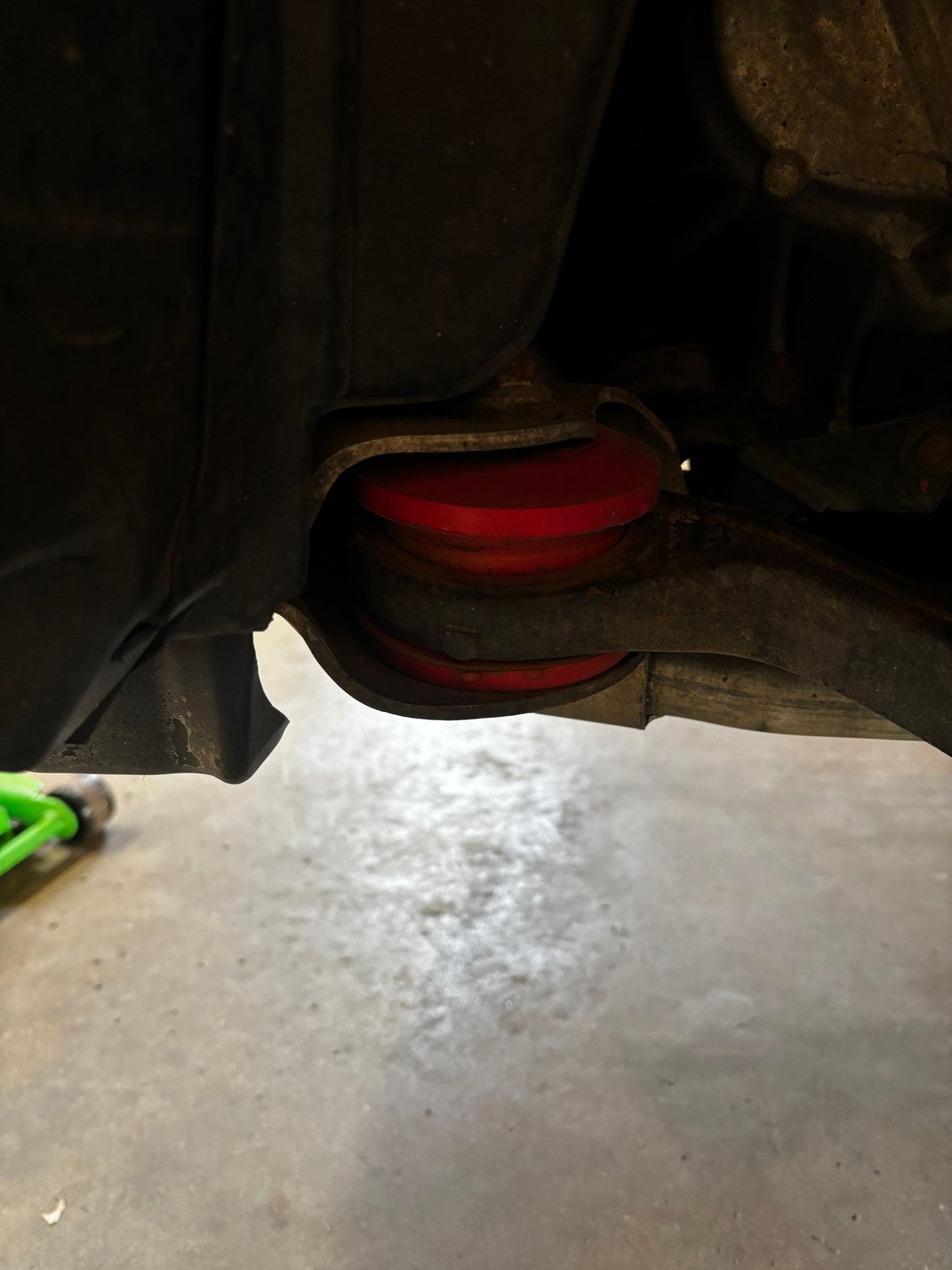 You can see the arm moving around the bushing