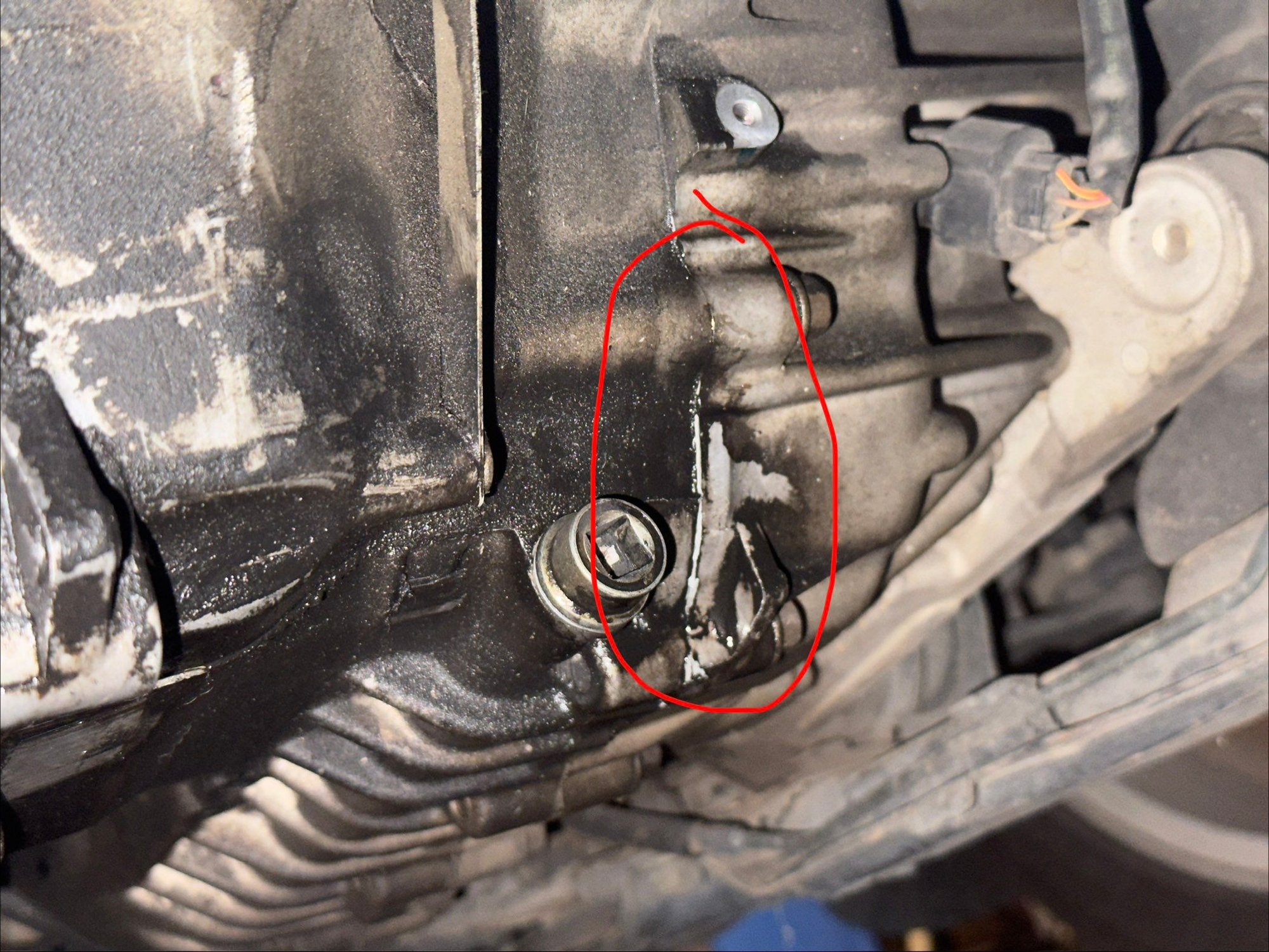 Fluid was flowing down the seam inside the red circle, looked like it was either leaking across the whole seam or just at the top.