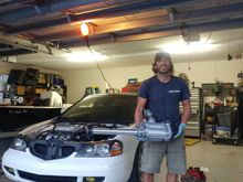 Here's a pic of my gay ass making love to the S\C before the installation. Before I installed the S\C I took it out for a spin to make sure that everything was fine. I don't know if it's because I haven't driven my car in months, but it felt very strong (fast)! I can't wait to see what the S\C does to it...