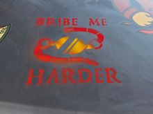 Spray painted on our hood after we attempted to bribe the judges regarding our upgrades.