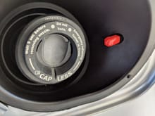 The cap installed on the bolt
