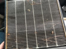 This is my Cabin Air filter at 50k miles. Easy to change. Only thing I noticed weird about my Purolator replacement was that it had the arrows pointing up instead of down like on the original filter so I just aimed it down to match. Hope I did that Correctly?
