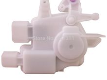 This is a front actuator - the white plastic piece at the top right with the pink/purple is different than the rear.