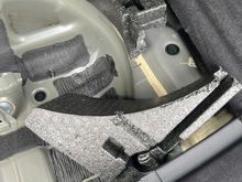 What can I use to glue this foam piece back into place? I see what looks like a yellow foam/glue that it looks like the factory maybe used. What is that?