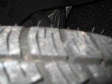 rubber strings showing how new these tires are