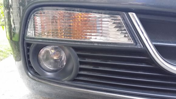 The reflector on this fog lamp is now recessed. Wasnt like this before and the bulb is out.