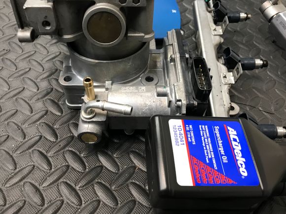 J37 throttlebody came in from my buddy at Acura. He’s flying to California tomorrow to pick up his MRP TL-S 6MT! Bet he’ll sell his 5AT within 12 weeks!

The J35 TB was set inside the J37 TB, and what a difference!!

More flow and cooler temps will come of this. Cooler temps because of the lack of bottle neck. This will ease the strain on the M90 pulling air in, and thus the engine.