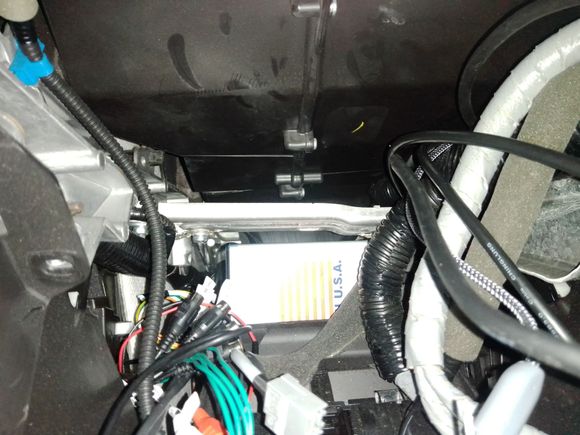 I dropped the Navtool unit inside and underneath the radio.