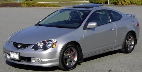 Satin Silver Metallic RSX w/blacked out headlights, lowered on eibach prokit with Canadian gunmetal typeS rims.