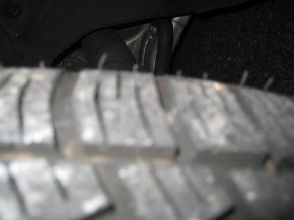 rubber strings showing how new these tires are