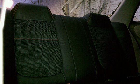 Custom 2 tone Leather seats (black outer, perforated inner, double red stitch)