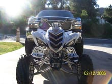 front of raptor 700 and truck