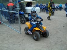 Michelle's first ATV (Kazuma Meerkat 50), at her ATV course.  Did she grow out of it, or what?