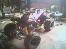 my first fourwheeler  96 blaster, lowered front and back, advanced timing, reed spacer, paul turner exhaust, dg bumper, terry cable throttle, wiseco pison bored .60 over, clamp on air filter, aluminum back rims.
