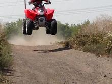 My son on his new TRX250