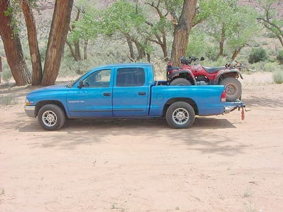 My Dakota V8 Club Cab does the job of transporting my ATV.