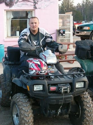 me sitting on the 700EFI at the pink store at bull gap.                                                                                                                                                 