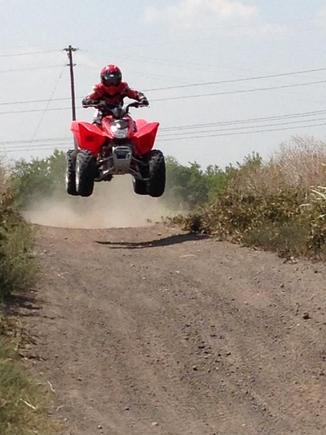 My son on his new TRX250