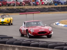 E-type leading a Mistral sports car.