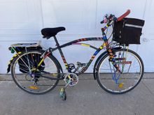 My 'commutocruiser'. Was my primary bike for years, then got dragged behind my truck at 65 mph. Wrapped it in 3M tape & kept going. Has almost 22,000 miles so far.