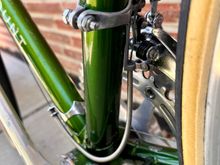 Early front derailleur, with a cable stop, requires a different cable clamp