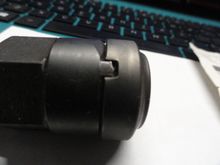 Th engagement of the tool with a lock ring.  The ring had left-hand threads so it is important to turn it the right way to dis-engage it from the freehub.