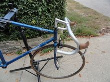 The Japanese bar and stem set up from the Raleigh were added but the Campy brake levers will have to go. No really nice parts on this ride.  Front brake is a black anodized model of something like a Tektro recessed bolt model.  