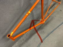 Those were caused when the still wet frame hit the support stand. Must sand and reshoot. 