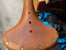 Bought a cheap bike yesterday primarily for the saddle. It was stored outside and has really dried out. I tried some leather cleaner on it yesterday, and A little naphtha to remove some old paint, But before I proofide my