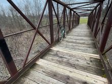 This little bridge joins a park to an elementary school. It’s pretty short, but the design and patina appeal to me.  And, it’s a SteamRoller a classic yet? I think Surly is ending production. Maybe a classic and not yet vintage…
Feel free to report me if I’m breaking the rules…😬
