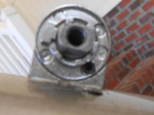 Left shifter.  Note the set screw. Note the cable entry via the frame..This is a friction shifter, but it uses the insets on the backing plate just the same.