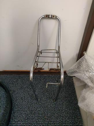 A front rack that needs some rust removal and shining. This is a whole lot bulkier and heavier than the ones the French usually fitted their randonneurs with, so I'm not sure if it'll stay
