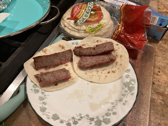 Final product. Smoke wring with mesquite will preserve the pig for about a week. Yup if kept refrigerated it will last the week. Tortillas last a month due to the preservatives lol that are banned in California. Very filling and delicious. 