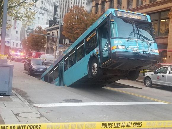 Pittsburg - Bus stopped at traffic light, then this happened.