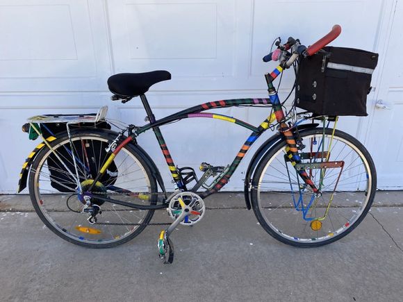 My 'commutocruiser'. Was my primary bike for years, then got dragged behind my truck at 65 mph. Wrapped it in 3M tape & kept going. Has almost 22,000 miles so far.