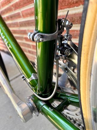Early front derailleur, with a cable stop, requires a different cable clamp