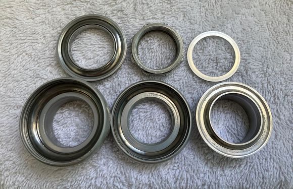 Note the alloy washer has no tab cause the fork it was on had no slot, but can find a tabbed washer for the buyer, if wanted