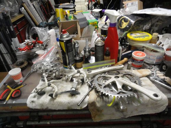 The work bench.  Looks like an unpacked Box O' Crap on the front half