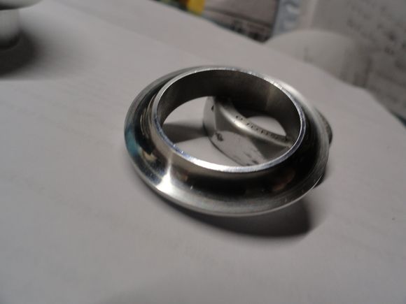 Lower race after reconditioning.  Dimples gone and nice shinny surface for bearings to ride on.
