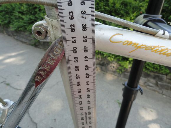 Size from center of BB Chrome and white paint with a bit of pearl appearance. 