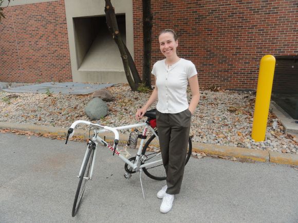 Emily with the bike.  And I think she looks pretty happy, so I think we have  win for her.