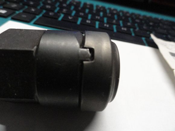 Th engagement of the tool with a lock ring.  The ring had left-hand threads so it is important to turn it the right way to dis-engage it from the freehub.