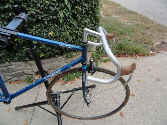 The Japanese bar and stem set up from the Raleigh were added but the Campy brake levers will have to go. No really nice parts on this ride.  Front brake is a black anodized model of something like a Tektro recessed bolt model.  