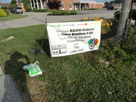 Signage in front of the station, with parking space for some teams for extended breaks.