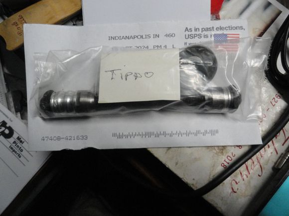 Tippo axle assembly salvaged from a hub destroyed removing a freewheel that was on a hub with the spokes cut before FW removal.  