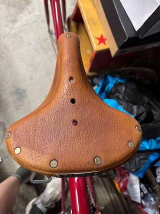 Bought a cheap bike yesterday primarily for the saddle. It was stored outside and has really dried out. I tried some leather cleaner on it yesterday, and A little naphtha to remove some old paint, But before I proofide my