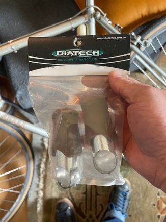 Some kind of dia compe knock off. 

They aren’t exactly lever shaped, but give a good place to pull when honking. 
