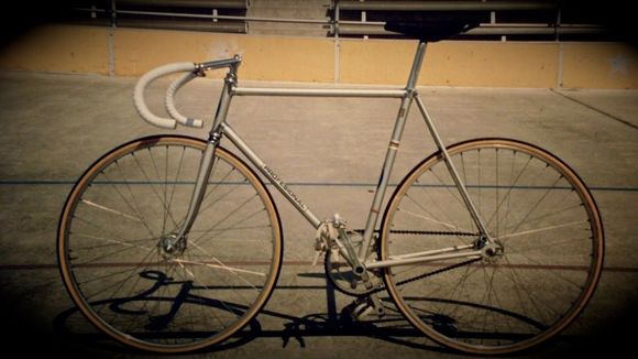 My old Windsor Pro - Campy cranks, Campy hubs, Campy pedals, Cinelli steel stem and bars, I think I had a Cinelli saddle here as well. Photo taken at the Dominguez Hills Velodrome in California 1987.