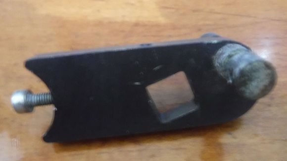 If I saw this piece alone I'd not have thought it was connected to shifters in anyway. It does have that square hole though that the above piece could fit into - if it's supposed to fit in there??